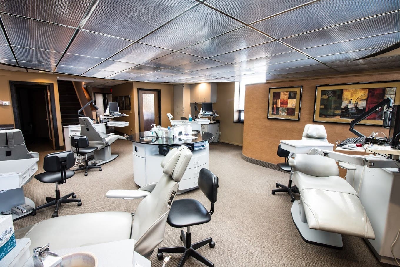 Ferri Orthodontics' Mt Pleasant office exam chairs Friendly orthodontic exam chairs at Ferri Orthodontics Mt Pleasant office, welcoming patients with a smile.